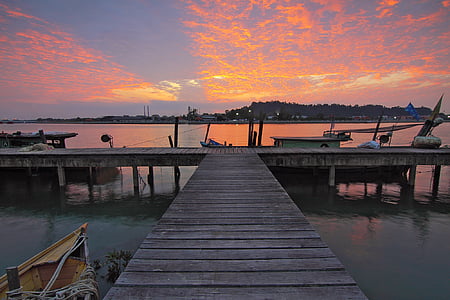 wooden dock during sunset thumbnail