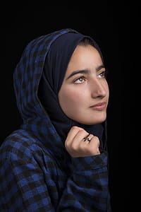 Woman in Black and Blue Plaid Headscarf thumbnail