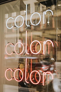 turned on color neon signage on clear glass wall thumbnail