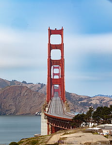 Golden Bridge surrounded of mountain thumbnail