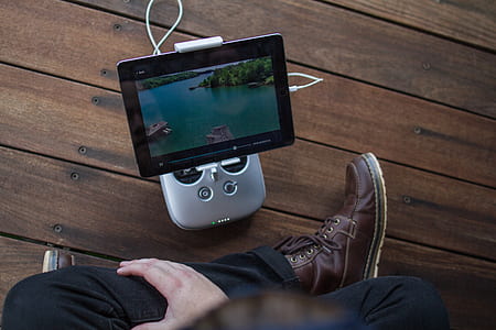 person watching on tablet computer thumbnail