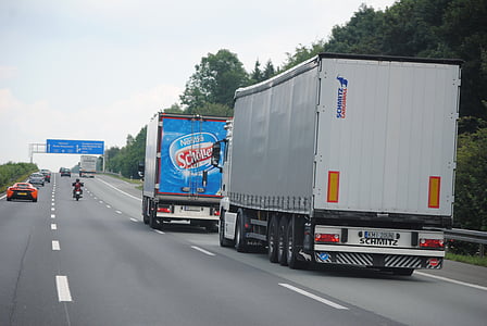 two box truck on gray concrete road thumbnail