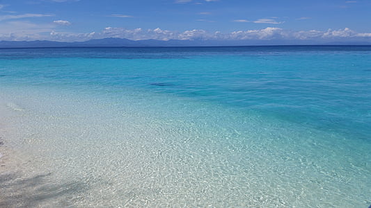 photo of seashore during daytime thumbnail