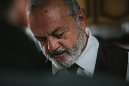 man in black collared tops thumbnail