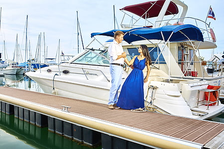 couple beside center console boat thumbnail