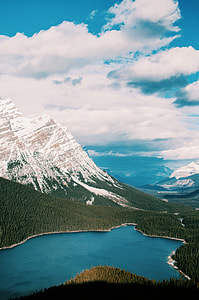 mountain near body of water at daytime thumbnail
