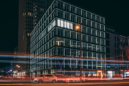 time lapse photography of gray building thumbnail