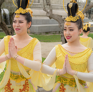 woman wearing yellow traditional dress thumbnail