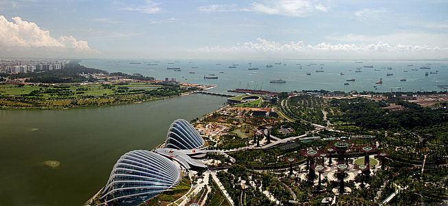city building and body of water aerial photography during day time thumbnail