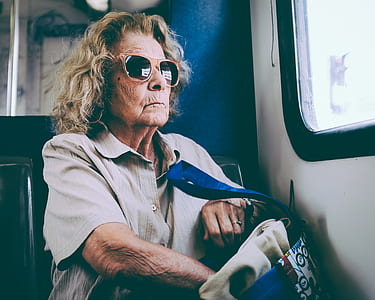 woman staring outside the windows thumbnail