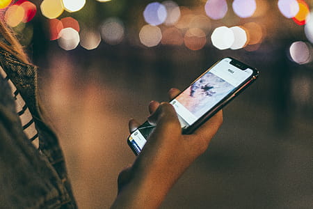 Person Holding Space Gray Iphone X thumbnail