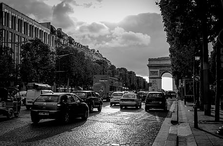 Grayscale Photo of Busy Streets With Building thumbnail