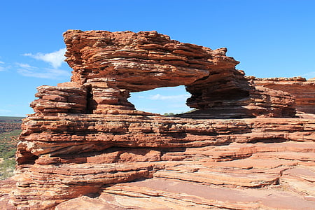 rock formation under blue sky thumbnail