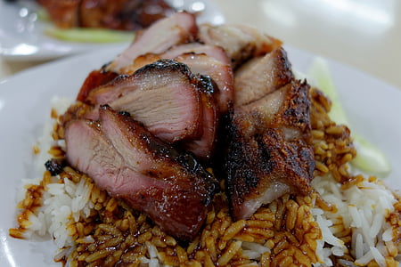 sliced pork on white rice thumbnail