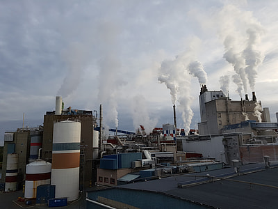 white smoke coming out from factory exhaust pipes thumbnail