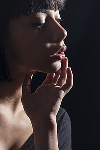 women's black eye lash and red-shade of lipstick thumbnail