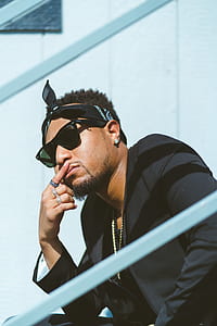 man wearing bandana and sunglasses thumbnail