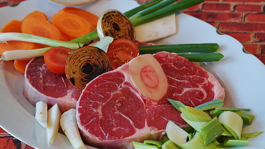 raw meat with spring onions and sliced carrots thumbnail