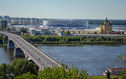 gray concrete bridge and buildings at daytime thumbnail