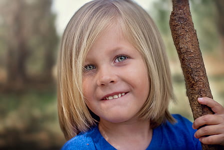 toddler wearing blue top thumbnail