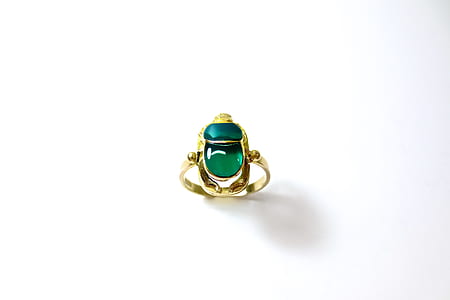 gold-colored with green gemstone ring thumbnail