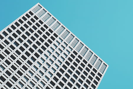 low angle photo of white building thumbnail