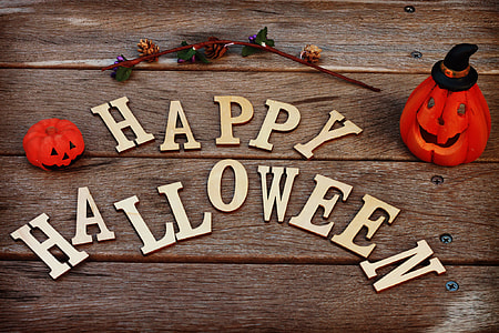 photo of brown Happy Halloween and orange jack-o-lantern decors thumbnail