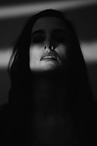 grayscale photo of woman thumbnail