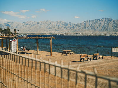 landscape photography of bridge near body of water thumbnail