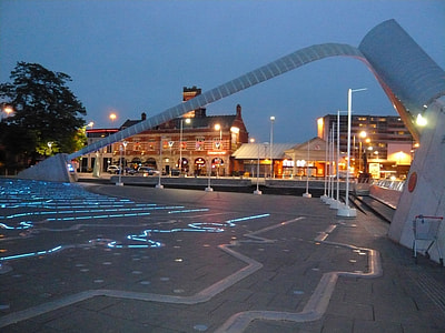 Millennium Square by night, showing the Time Zone Clock in Coventry, England thumbnail