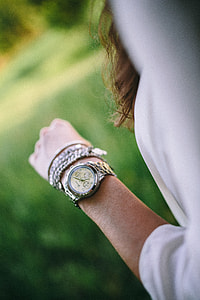 Silver watch on the girl's arm thumbnail