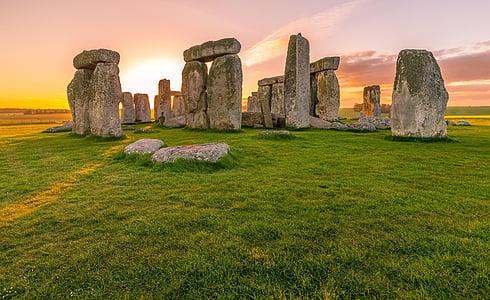 rock formation on green grass lawn thumbnail