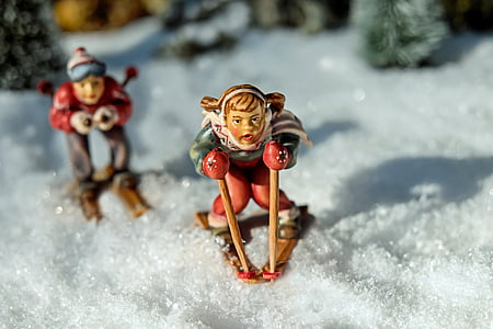 two person on ski blades ceramic figurine thumbnail