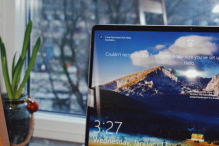 black laptop computer turned-on thumbnail