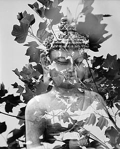 grayscale photography of Buddha standing thumbnail
