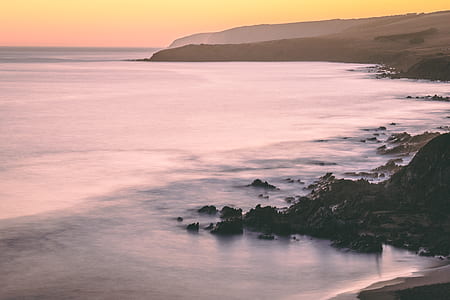 rocks besides the seashore thumbnail