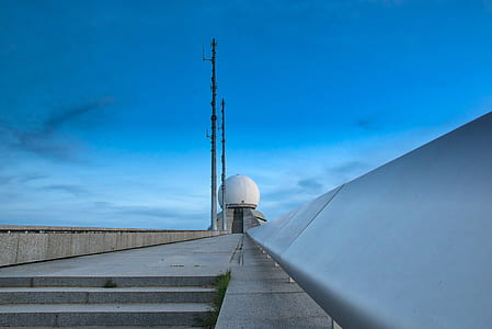 white roof turbine under blue clear sky during daytime thumbnail