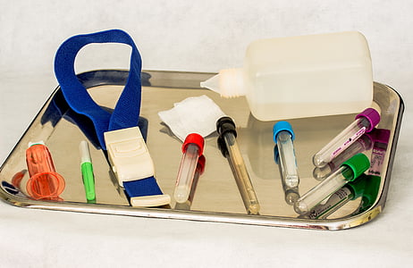 assorted-color test tubes on gray tray thumbnail