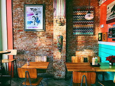 two brown wooden side tables inside store thumbnail