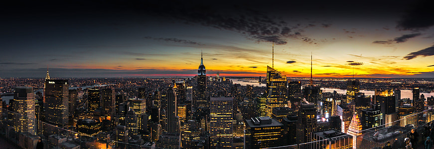 aerial photography of city buildings during sunset thumbnail