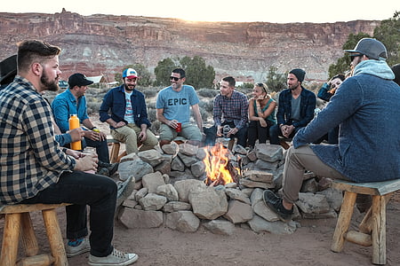 people sitting in front campfire thumbnail