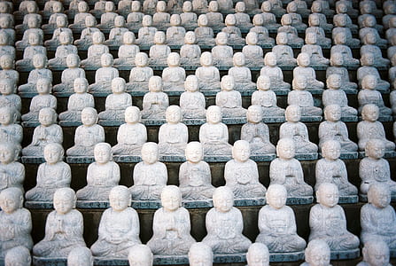 gray concrete buddha statues thumbnail