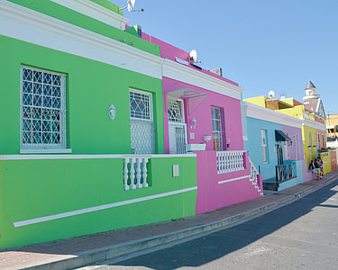 assorted-color concrete buildings at daytime thumbnail