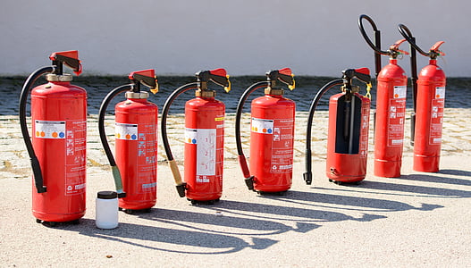 seven fire extinguisher on seashore thumbnail