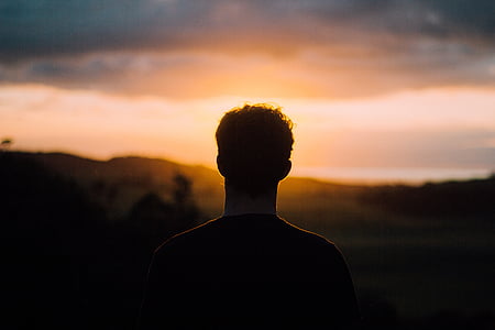 silhouette of man during sunset thumbnail