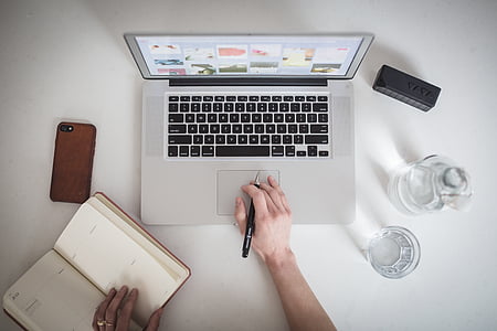 white and black laptop computer thumbnail