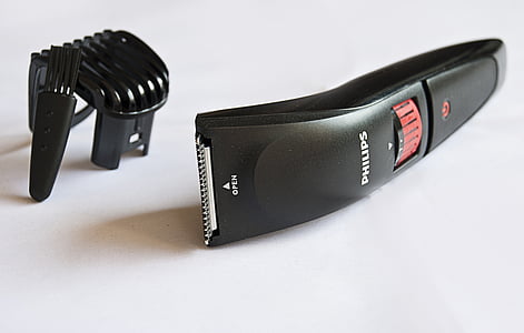 black and red Philips wireless hair clipper thumbnail