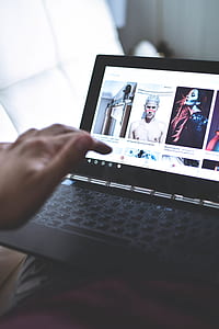 person using black laptop computer thumbnail