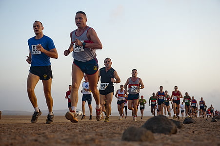 men running during daytime thumbnail