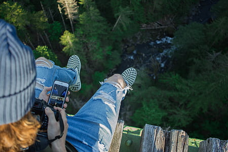 person holding Android smartphone thumbnail